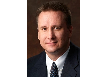 JAMES A. FOLEY