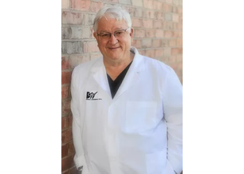 DR. DAVID C. WOODBURN, DDS