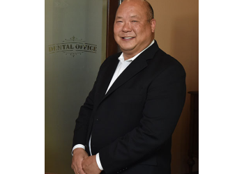 DR. H. PETER KU, DDS, P.A