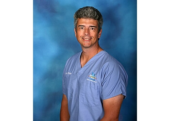 DR. RONALD K. RISINGER, DDS, MS